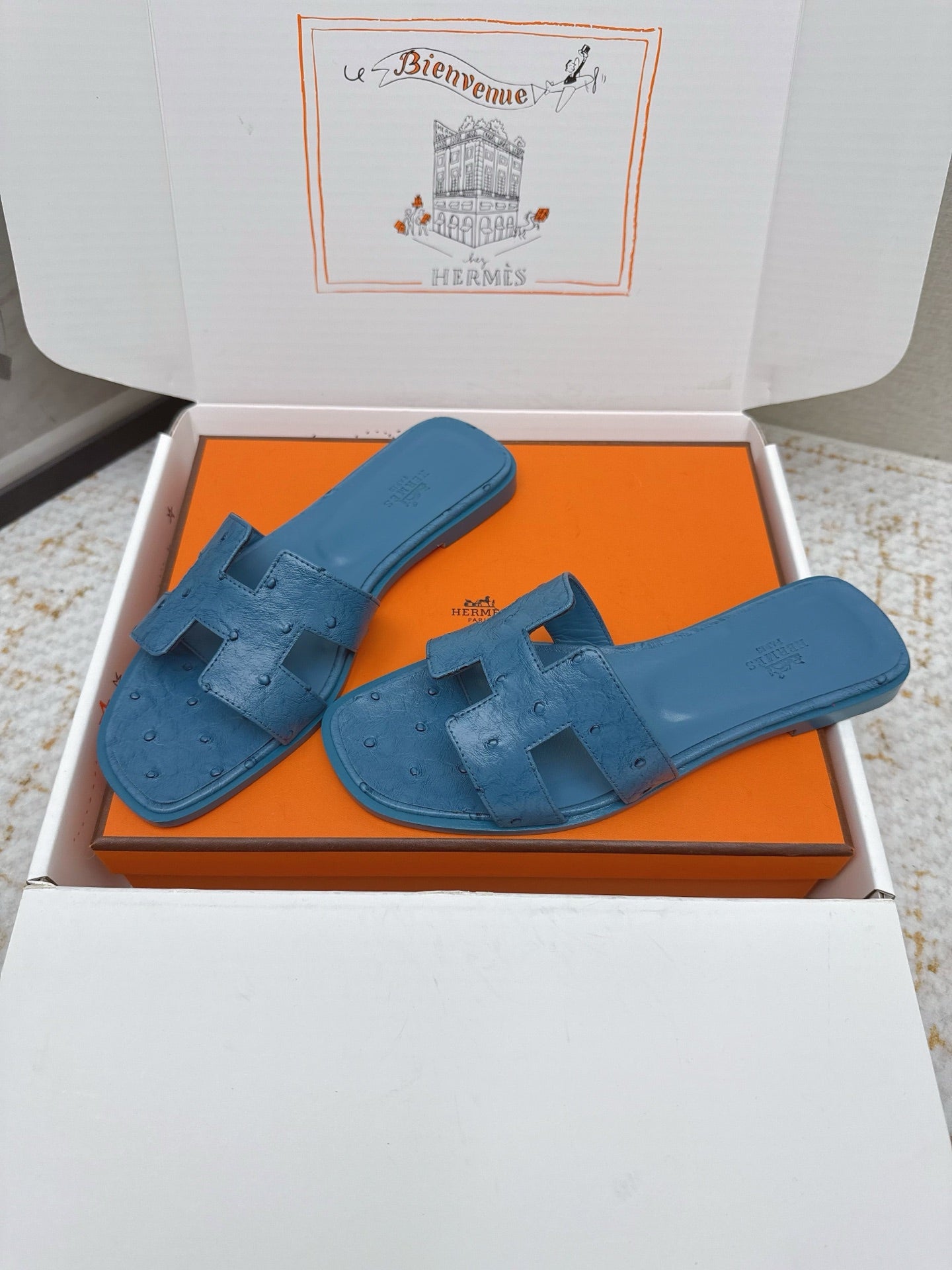 HM 26ss Oran Sandals Blue Ostrich Leather 625100