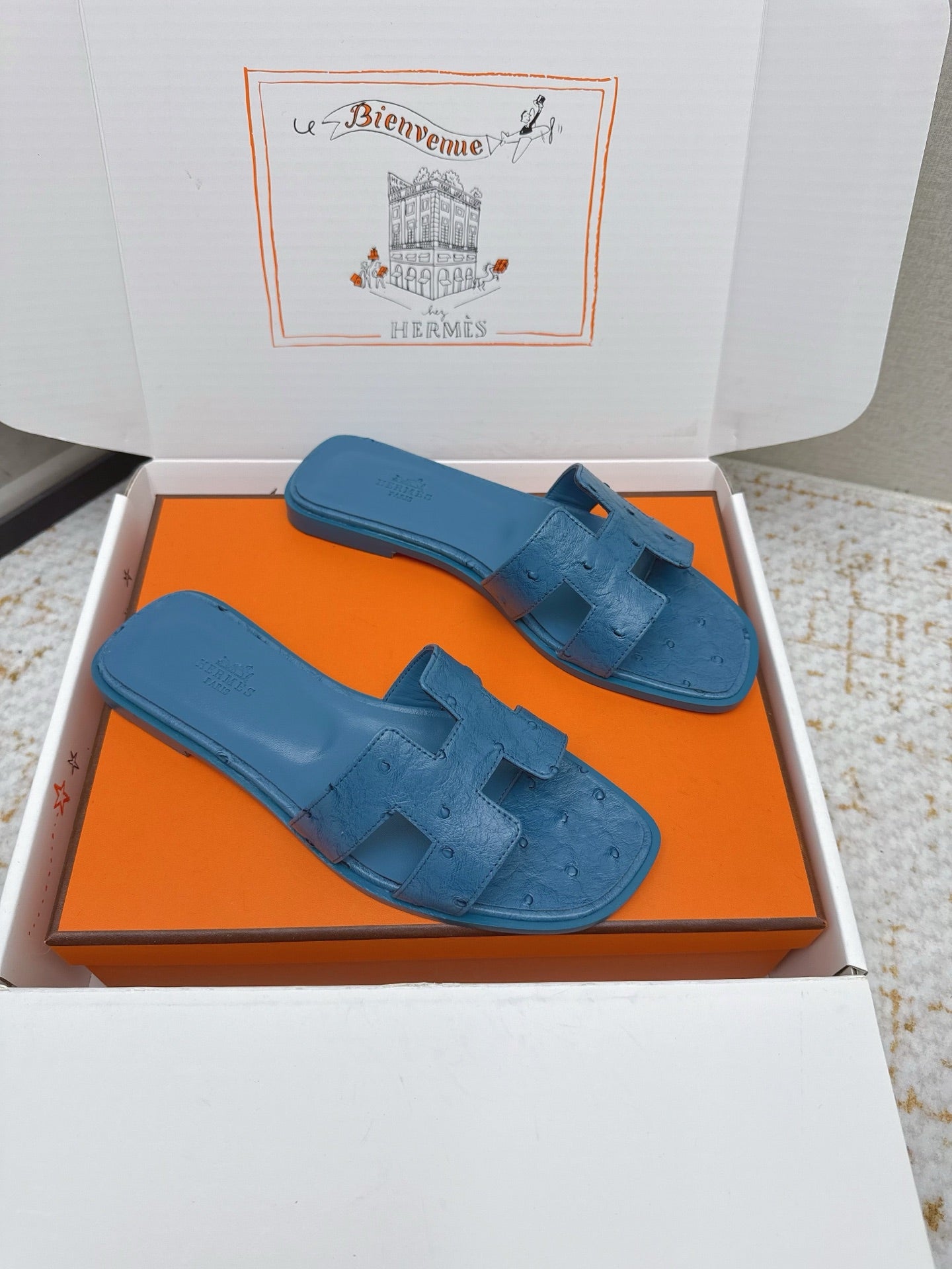 HM 26ss Oran Sandals Blue Ostrich Leather 625100