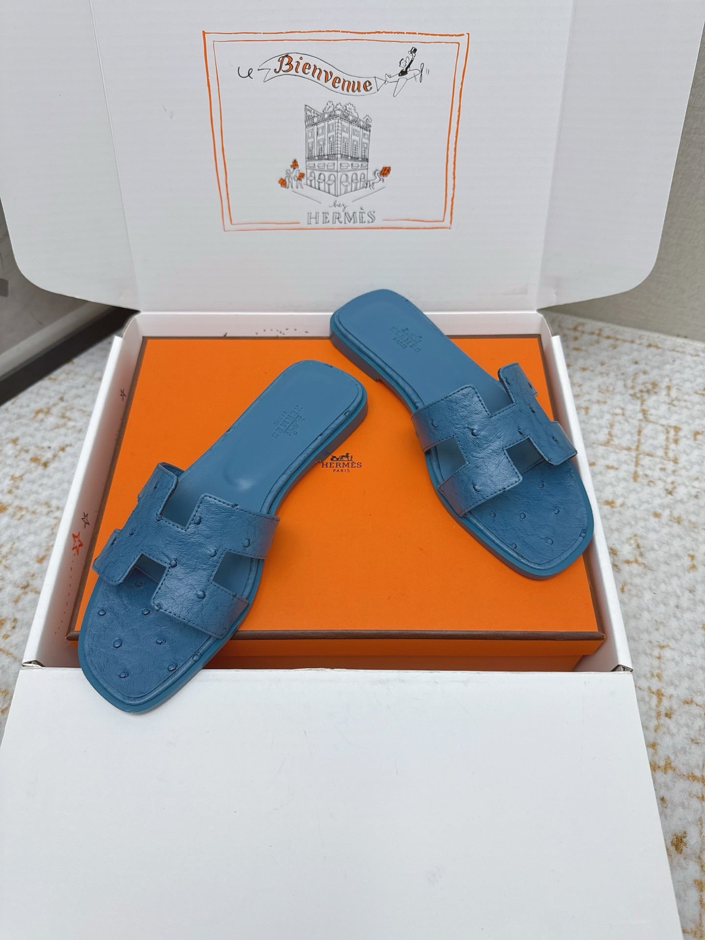 HM 26ss Oran Sandals Blue Ostrich Leather 625100