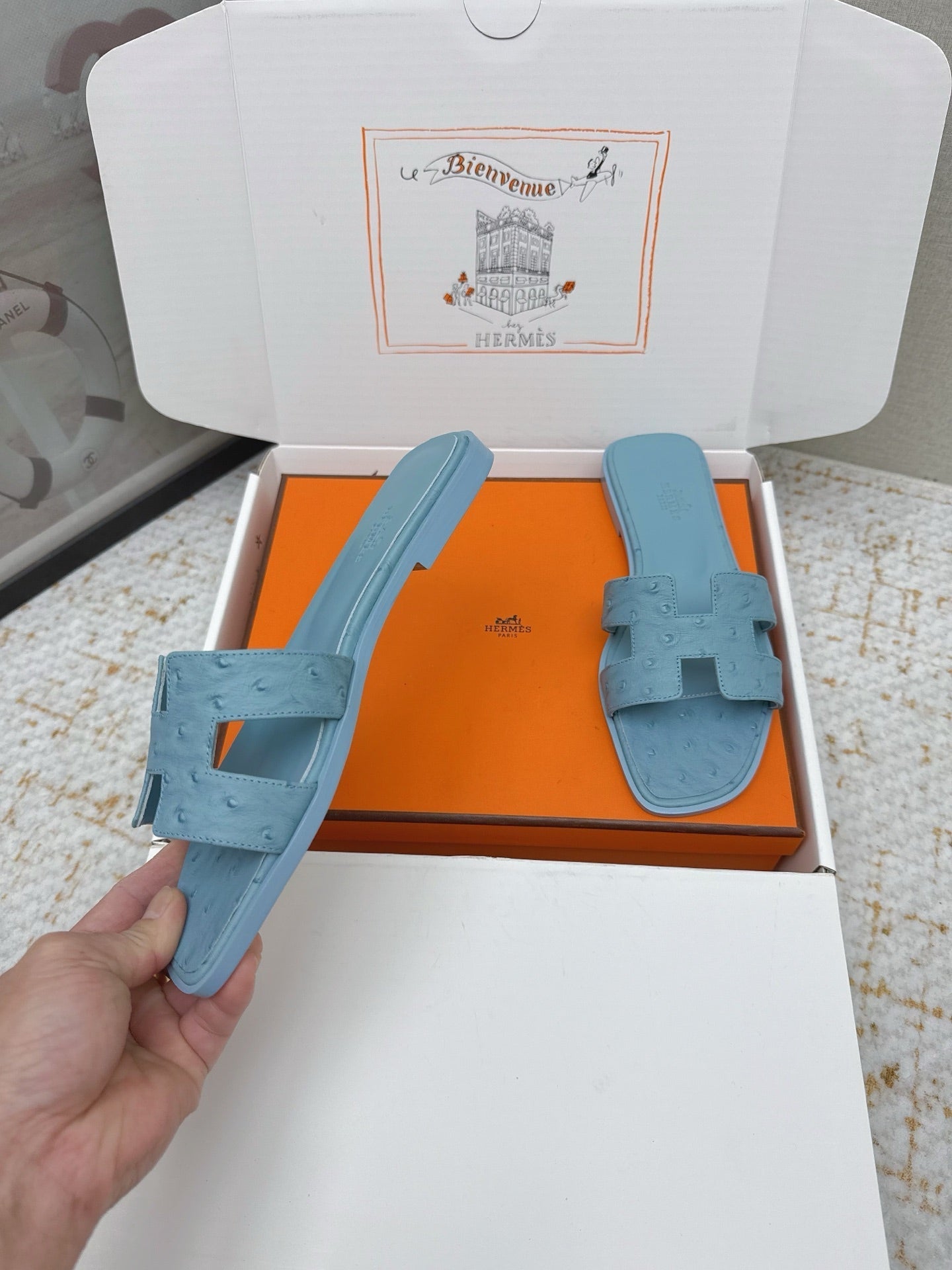 HM 26ss Oran Sandals Light Blue Ostrich Leather 625103